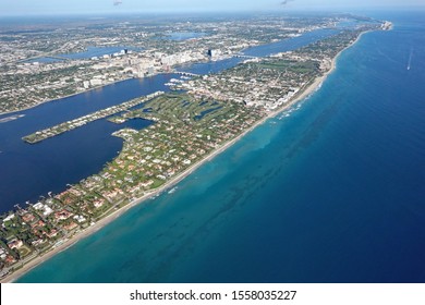 Aerial View Of West Palm Beach, Florida And The Upscale Island Of Palm Beach, With Lake Worth Lagoon.