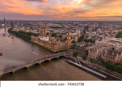 Aerial View Of Westminster Bridge And Houses Of Parliament With A Stunning Sunset In The Background. London, England