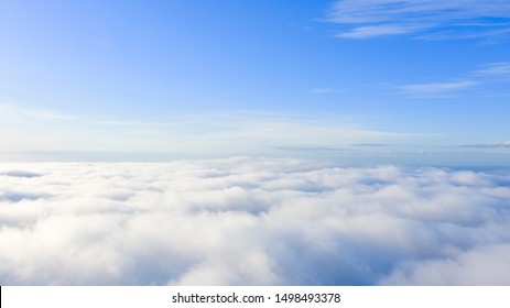 Aerial view White clouds in blue sky. Top. View from drone. Aerial bird's eye. Aerial top view cloudscape. Texture of clouds. View from above. Sunrise or sunset over clouds - Shutterstock ID 1498493378