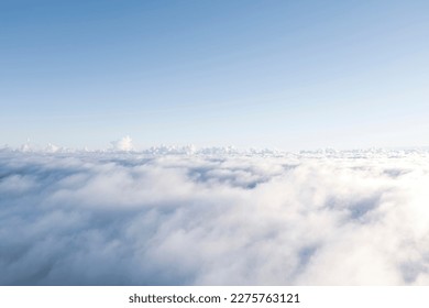 Aerial view White clouds in blue sky. Top. View from drone. Aerial bird's eye. Aerial top view cloudscape. Texture of clouds. View from above. Sunrise or sunset over clouds - Shutterstock ID 2275763121