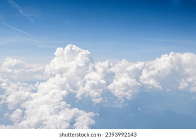 Aerial view White clouds in blue sky front view. Aerial cloudscape. Texture of clouds. soft sky background in the morning - Shutterstock ID 2393992143