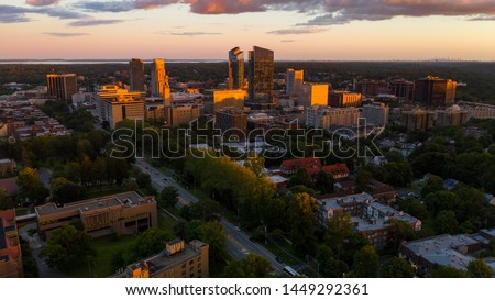 an aerial view of White Plains New York at sunset look up on the horizon for Manhattan