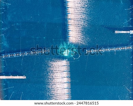 Similar – Aerial view of small boat in sea, copyspace for text