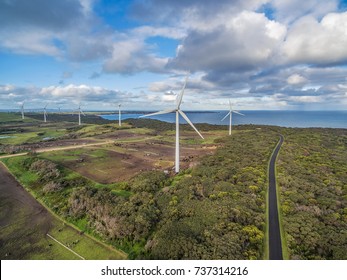 Aerial view of wind farm, ocean and agricultural fields in Australia