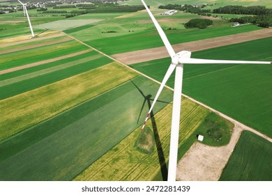 Aerial view of wind turbine in agricultural landscape - Powered by Shutterstock