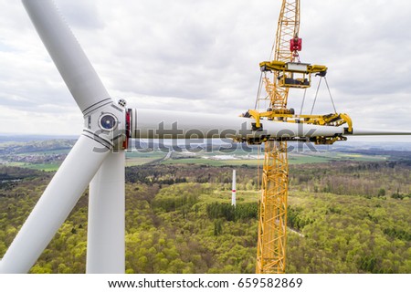 Aerial view of wind turbine under construction

