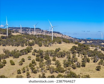 Aerial View of Wind Turbines, taken from a Drone at the White Rock Wind Farm out near Glen Innes, NSW, Australia - Powered by Shutterstock