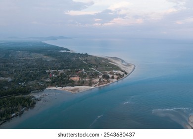 Aerial view of a winding river making its way through a vibrant mangrove forest - Powered by Shutterstock