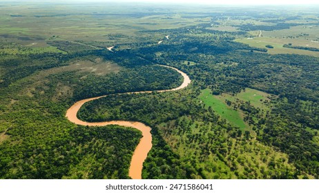 Aerial view of a winding river through Hato La Aurora, Casanare, Colombia - Powered by Shutterstock