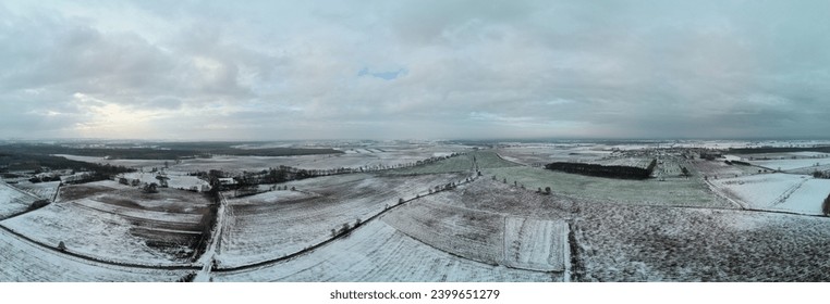 Aerial view, winter, fields and meadows covered with snow.