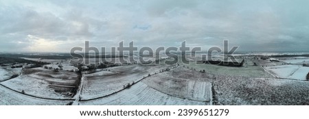 Aerial view, winter, fields and meadows covered with snow.