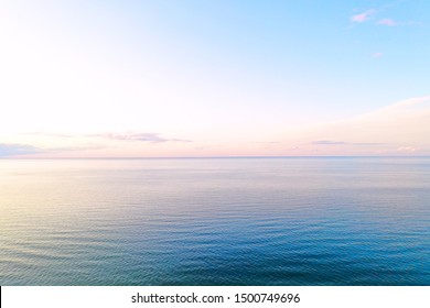 Aerial view wonderful dark silver sea with sunset twilight sky in the evening time. Scenery moment. spirit of serene and zen. image for background, wallpaper, interior