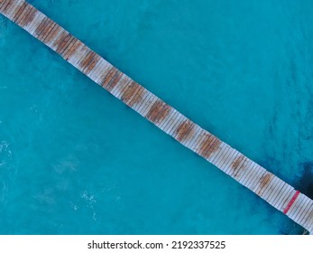 Aerial View Of A Wooden Dock On A Beach In Majorca.  Majorca Island, Balearic Islands, Spain. Vacation, Summer And Relax Concept