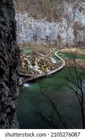 Aerial View At Wooden Hiking Path Through Water Besides Waterfalls In Plitvice Lakes National Park, Croatia