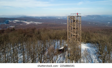 Aerial view of wooden lookout tower on the top of Velka Homola in winter, Male Karpaty, Slovakia - Powered by Shutterstock