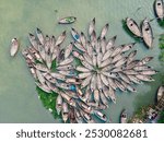 Aerial view of wooden passenger boats along the Buriganga River, Keraniganj, Dhaka, Bangladesh.