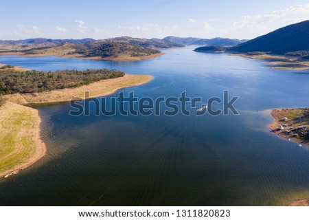 Aerial view of Wyangala Dam in central NSW. The Dam provides water storage for the Lachlan River and recreation area for camping and boating activities.