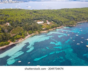Aerial view of yachts between Ile Sainte Marguerite and Ile Saint Honorat in mediterranean sea. Ile Sainte Marguerite is the largest of Lerins Islands, near Cannes town in French Riviera. Drone view.