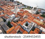 An aerial view of Zadar old city with Saint Anastasia Cathedral and Saint Donatus Church. Drone view taken on 22nd of October 2024 in Zadar, Zadar County, Croatia.