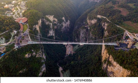 Aerial View Of Zhangjiajie Grand Canyon And Glass Bridge On Sky Sunset, China