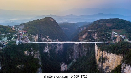 Aerial View Of Zhangjiajie Grand Canyon And Glass Bridge On Sky Sunset, China