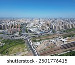 Aerial view of Zhengzhou North Railway Station, North Third Ring Road Rainbow Bridge, Jingguang Expressway and overpass in Huiji District, Zhengzhou City, Henan Province, China.