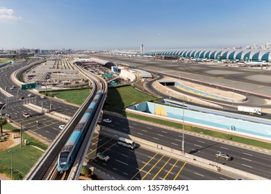 Aerial View.Airport Terminal With Airplanes Taxiing And Landing.In Dubai International Airport