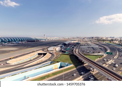 Aerial View.Airport Terminal with Airplanes Taxiing and Landing.In Dubai International Airport.