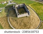 Aerial views of Castle Roy, 12th century fortress built by the Clan Comyn on a glacial mound north of the village of Nethy Bridge, Scotland. 