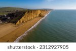 Aerial views of the jurrassic coast at Bridport ,westbay Dorset .Showing the cliffs beach and recent cliff collapse 