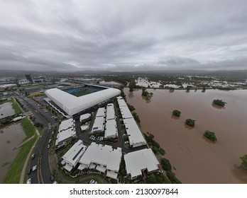 Aerial Views of the QLD Floods, water coming very close to houses and railway lines CBUS Stadium Robina Gold Coast QLD Australia 28 February 2022 