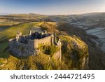 Aerial vista by drone of Carreg Cennen Castle, Brecon Beacons National Park, Carmarthenshire, Wales, United Kingdom, Europe