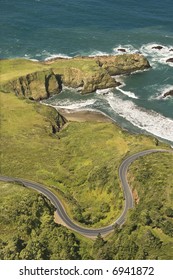 Aerial Of Winding Road Shoreline Highway On West Coast With Pacific Ocean In California, USA.