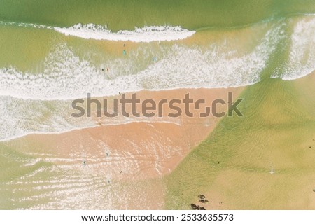 Similar – Aerial View From Flying Drone Of People Crowd Relaxing On Algarve Beach In Portugal