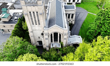 Aerially withdrawing while ascending from the view of a church