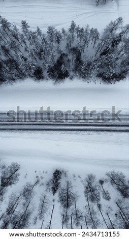 aerialview of a snow covered street in Finland.