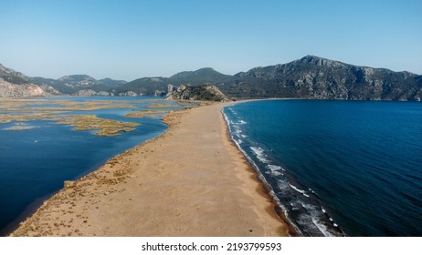 Aeriel Scenic Drone View  To Iztuzu Beach And The Dalyan River Delta Or Lake Sulungur. Explore Natural Wonders Of Turkey. Travel Destination