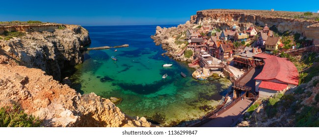 Aeril panorama of Popeye Village in the sunny day, Malta