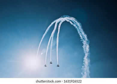 Aerobatic aircract making a loop on an airshow
