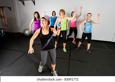 An Aerobics And Dance Class For Women At A Gym.