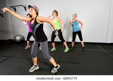 An Aerobics And Dance Class For Women At A Gym.