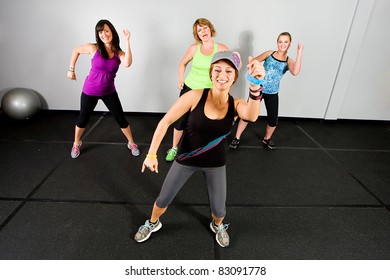 An Aerobics And Dance Class For Women At A Gym.