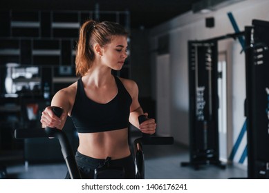 Aerobics on the bicycle. Photo of gorgeous blonde woman in the gym at her weekend time. - Shutterstock ID 1406176241