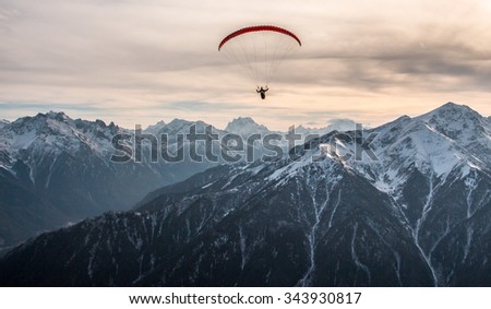 Aerofoto of the mountain Landscape and paraglader, The Caucasus.