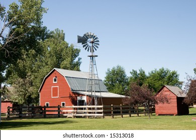 Aeromotor Windmill Used To Pump Well Water Stands In Barnyard