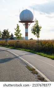 Aeronautical radar or aeronautical meteorological observations station tower with spherical radar antenna. Control tower with weather radar on airport. 