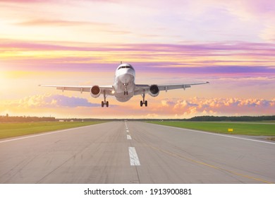 Aeroplane Landing At The Airport With Morning Good Calm