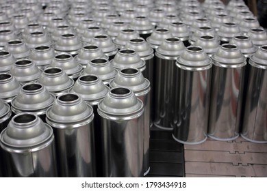 Aerosol Cans Being Filled In Factory