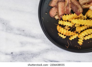 Aesthetic Close Up Shot Of English Breakfast Consist Of French Fries, Sliced Beef Bacon And Egg Placed On White Marble Table Texture For Food Photography Background Ideas