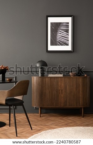 Aesthetic composition of living room interior with mock up posters frame, stylish wooden sideboard, books, gray wall with stucco and personal accessories. Home decor. Template.